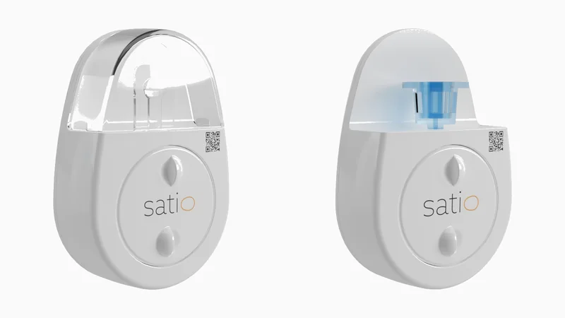 Wearable injector rendered closed and with the needle mechanism visible